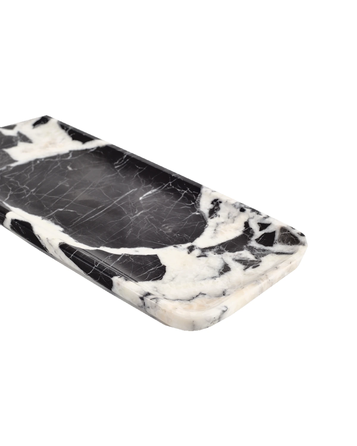 Angled view of the Bvlgari Black marble tray, Piece C, showing the polished edge and natural pattern.