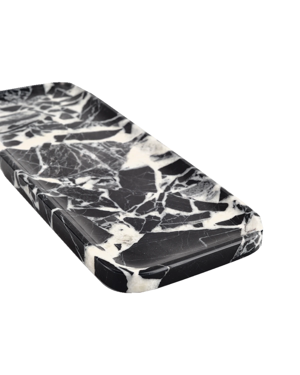 Low angled view of the Bvlgari Black marble tray, Piece D, showing its polished edge thickness.