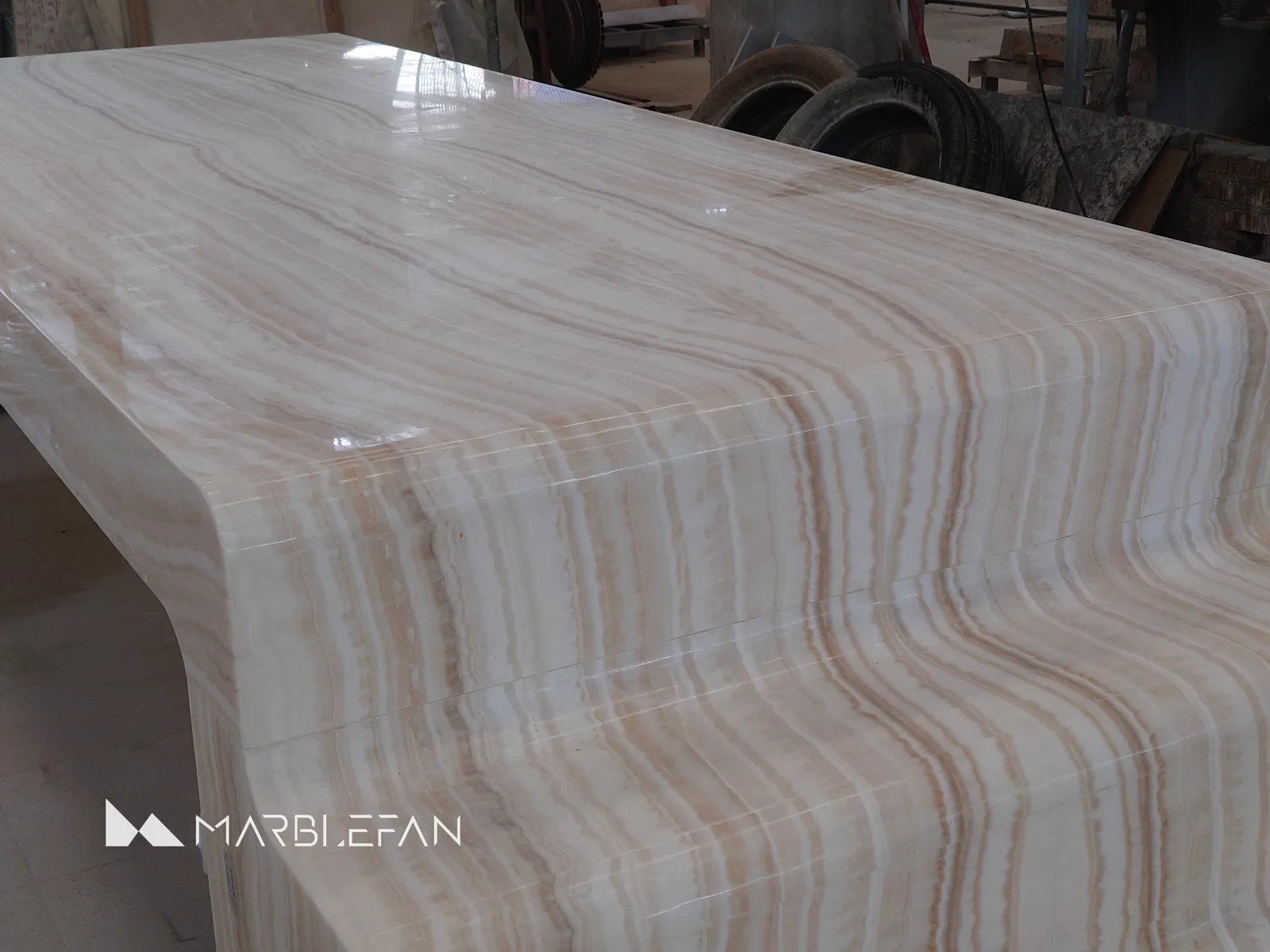 Finished marble tabletop photographed in the MarbleFan workshop.