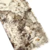 Close top view of the rectangular Patagonia Blanc stone tray, Piece B, showing its natural cream, brown, and grey pattern.
