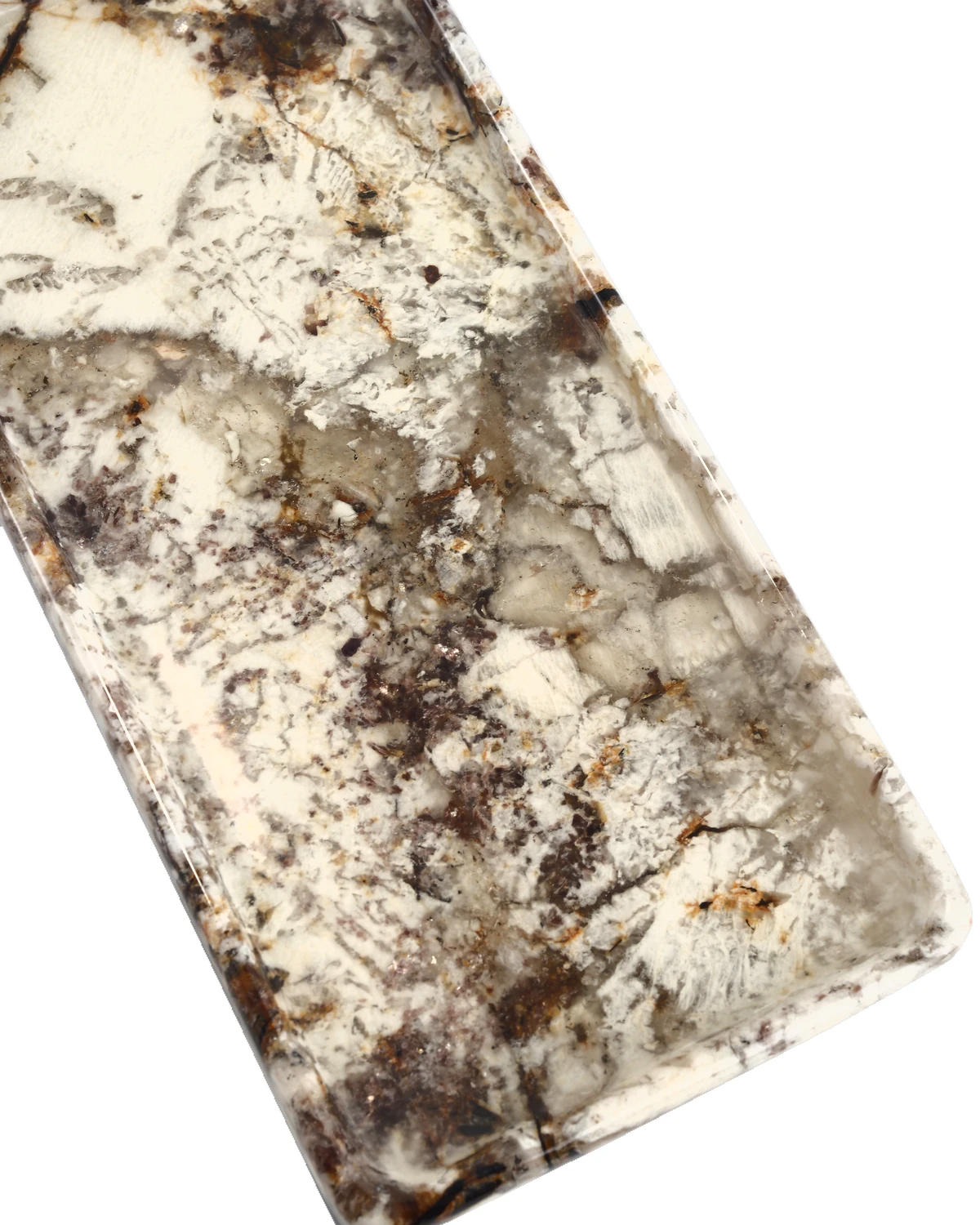 Close top view of the rectangular Patagonia Blanc stone tray, Piece B, showing its natural cream, brown, and grey pattern.