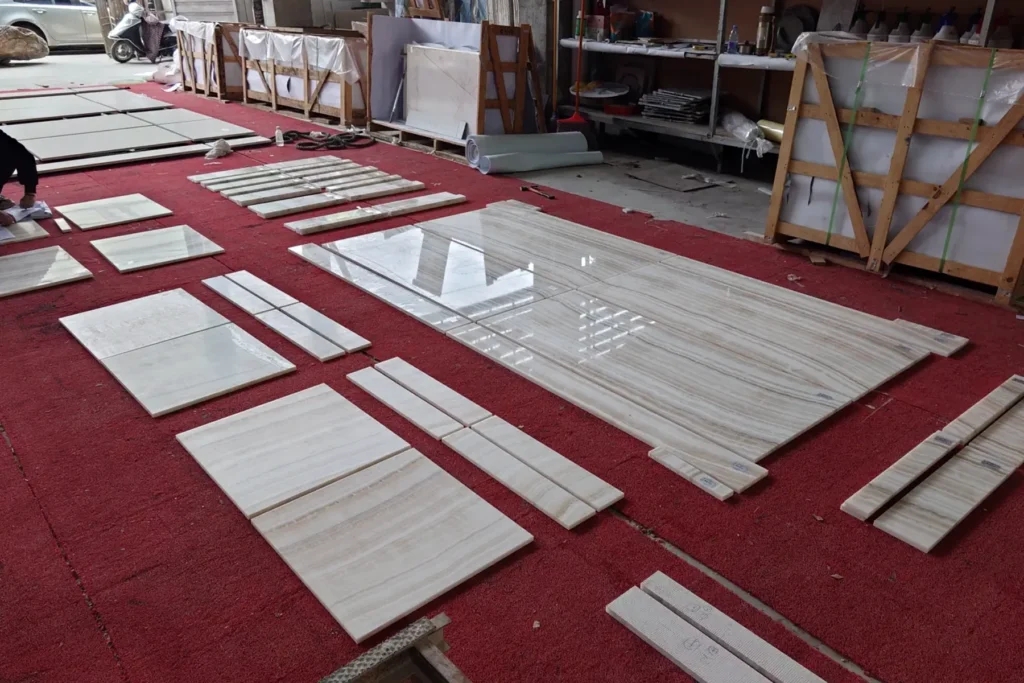 Custom-cut marble components arranged for project planning and production review.