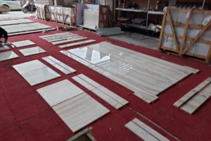 Custom-cut marble components arranged for project planning and production review.