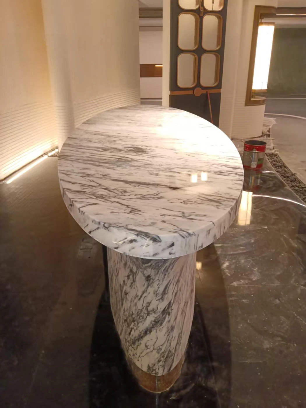 Rounded marble reception desk countertop and joint details